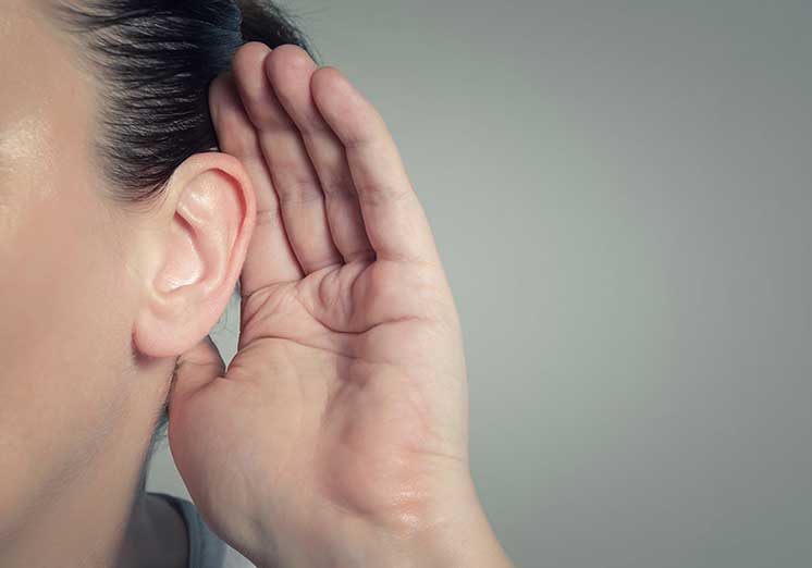 Image show hand behind ear