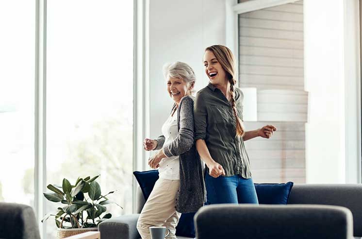 Image show woman and mother dancing