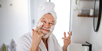 Man having fun with a face mask