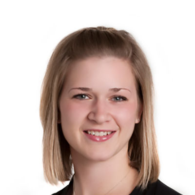 Suzanne Douziech with shoulder-length blonde hair against a white background