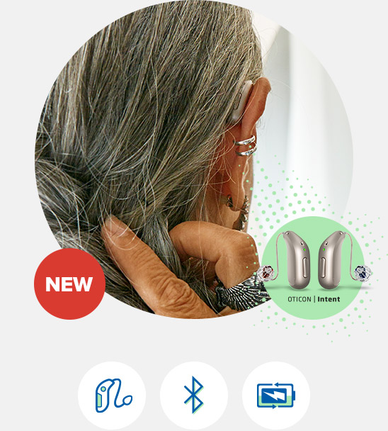 A close-up of a person with gray hair wearing an Oticon Intent hearing aid. Below, a 'NEW' label accompanies an image of the hearing aids, highlighting features such as Bluetooth compatibility.