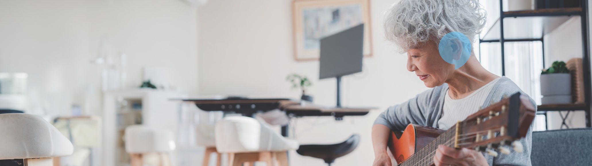woman playing guitar