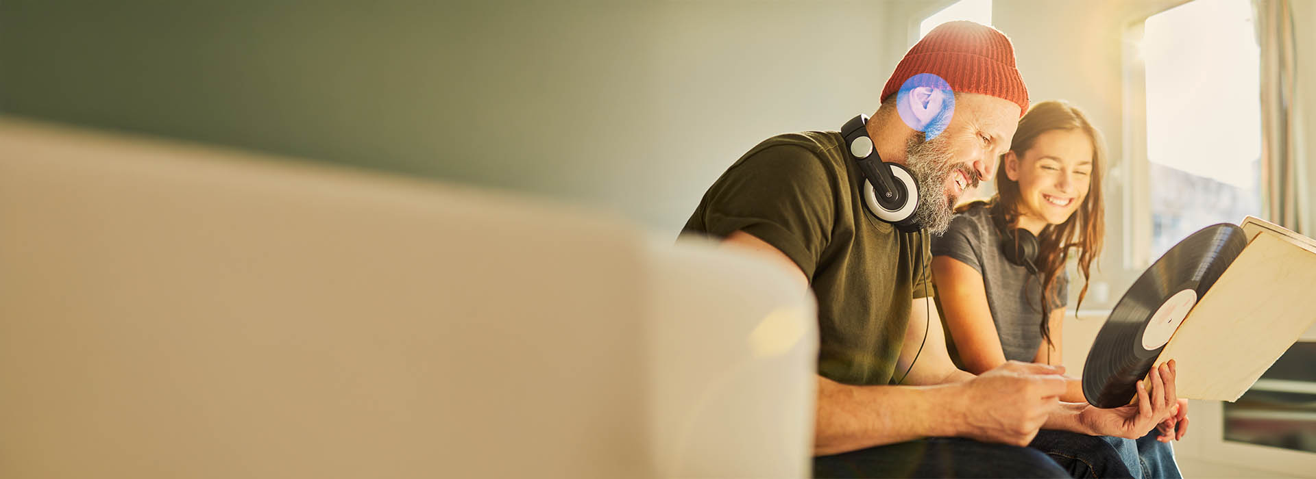 father and daughter seeeing a vinyl