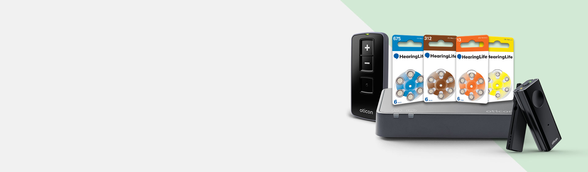 Hearing aid batteries and Oticon hearing device accessories displayed on a light background.
