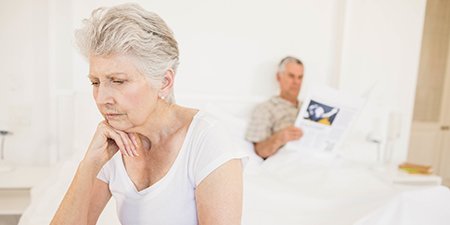Image show woman thinking and a man in reading in bet