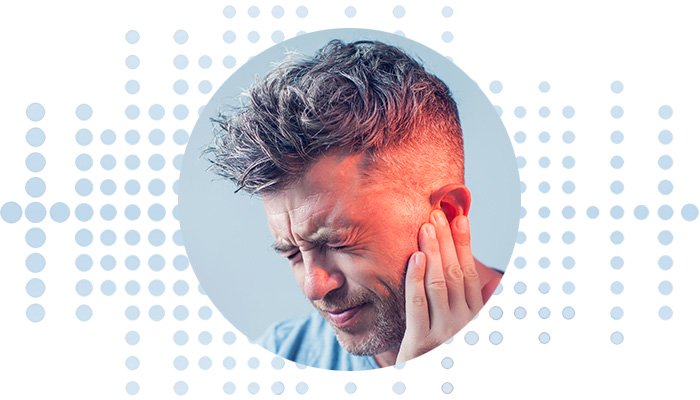 Man experiencing tinnitus symptoms, with a hand covering his ear and a gradient red overlay indicating discomfort.