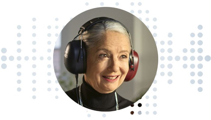 woman undergoing a hearing test with headphones