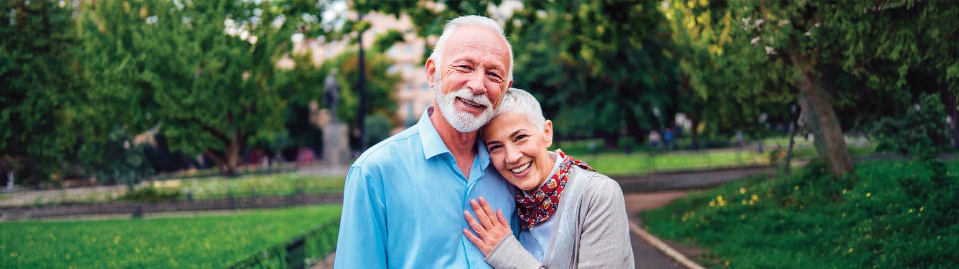 smiling and hugging couple