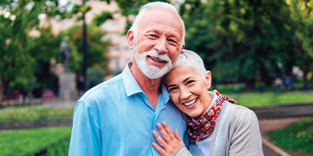 smiling and hugging couple