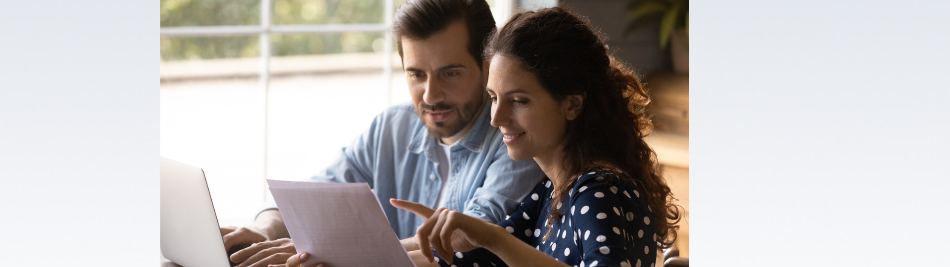 couple looking at a computer