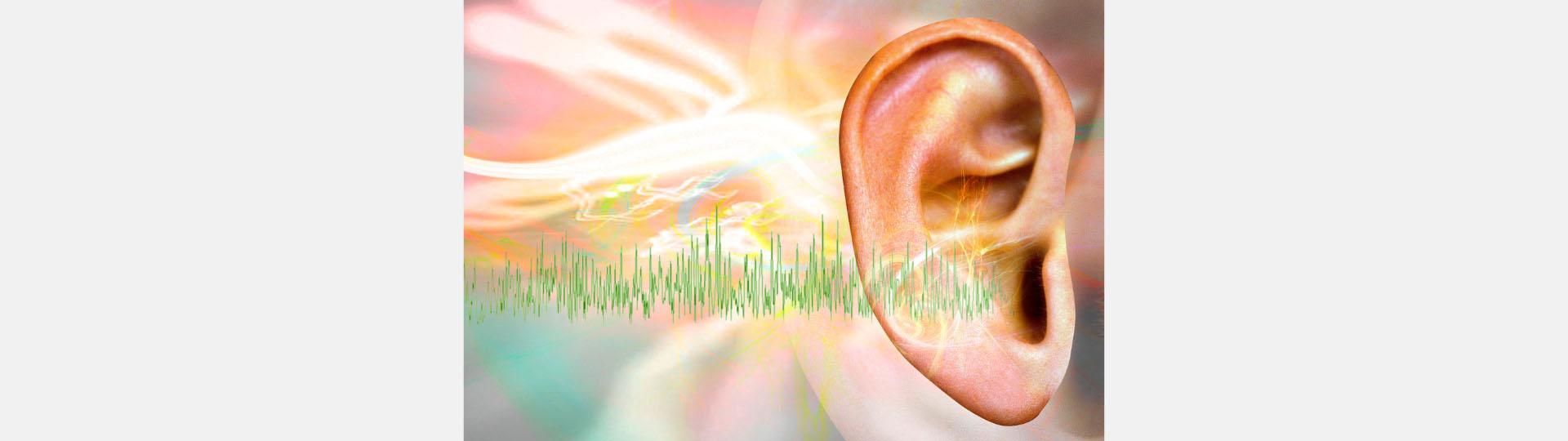 ear surrounded by colorful sound waves and glowing light patterns