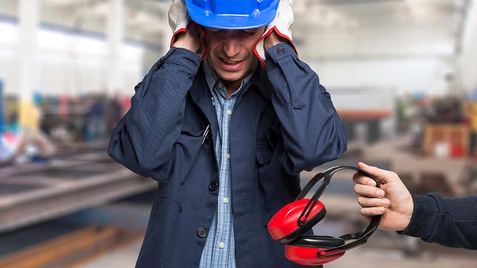 protecting hearing with noise-canceling earmuffs in industrial work environments