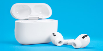 Apple AirPods® Pro with charging case against a blue background.