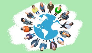 Diverse group of people standing in a circle around a globe illustration on a green background. The globe shows the Americas and symbolizes global unity.