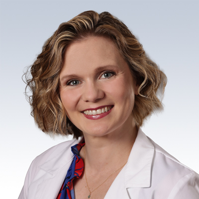 alyssa eastman, hearing care professional in a white coat