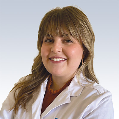 chloe cook, hearing care specialist in white coat