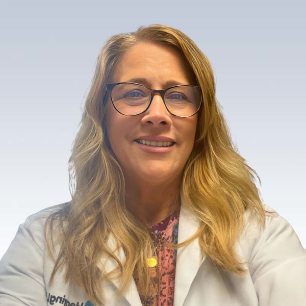 heather locklair is looking at the camera