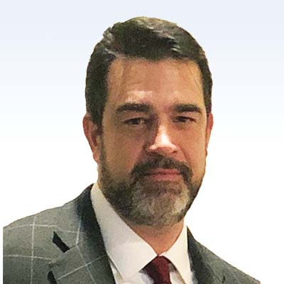 hearing care specialist in formal attire'