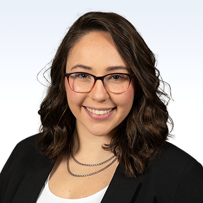 shannon monahan, hearing care professional, wearing a black blazer and white top