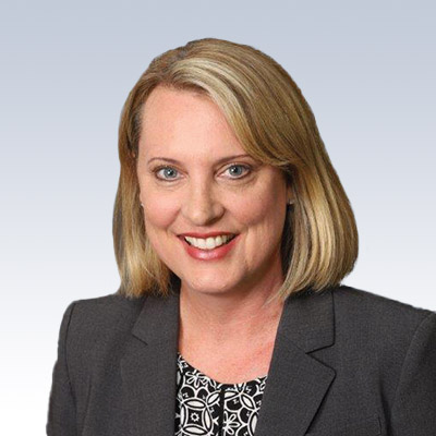 tracy woods, hearing care professional in business attire