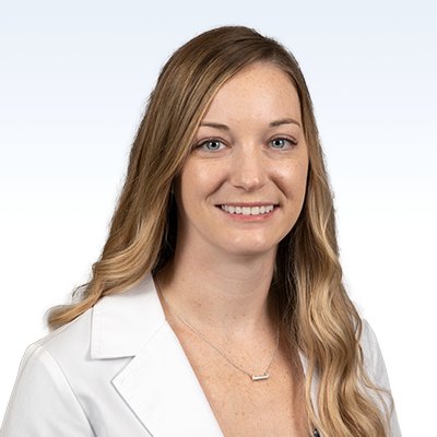 alison jarrett, hearing care professional wearing a white coat