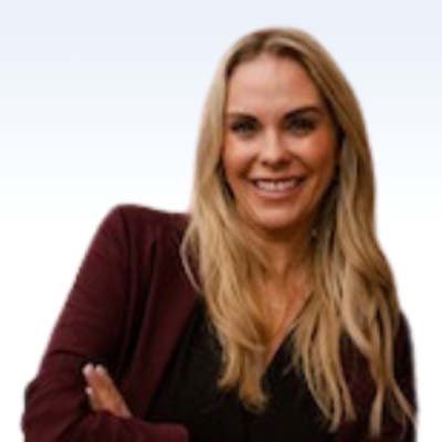 anna williams, hearing care specialist, with long blonde hair and a burgundy blazer