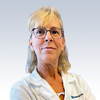 HearingLife hearing care professional wearing a white coat