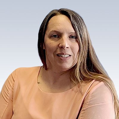 melissa sanders, hearing care specialist wearing a peach blouse