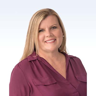 stephanie laforge, hearing care professional in a purple blouse