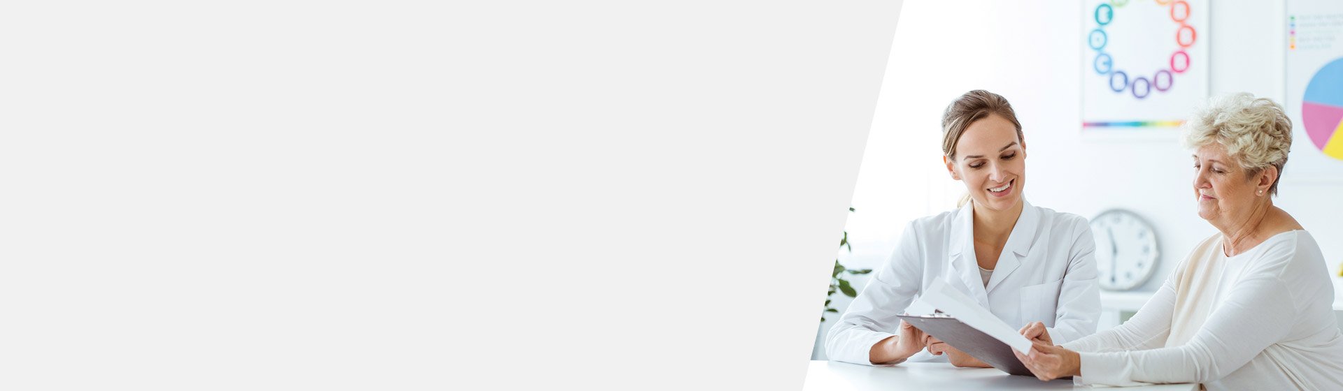 Customer reviewing HearingLife AfterCare Program with a hearing care professional.