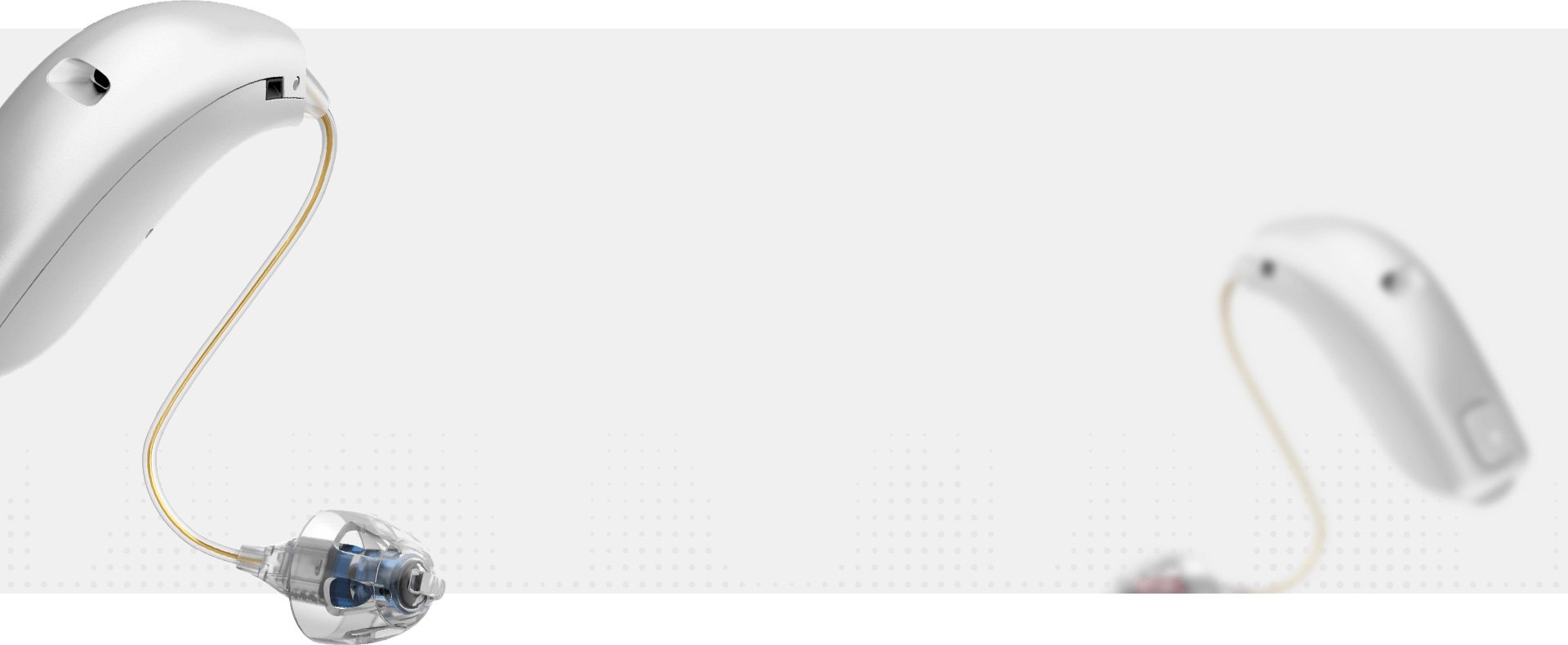 A digital hearing aid with a thin wire and ear canal insert, floating against a soft gray background with fine vertical dotted lines.