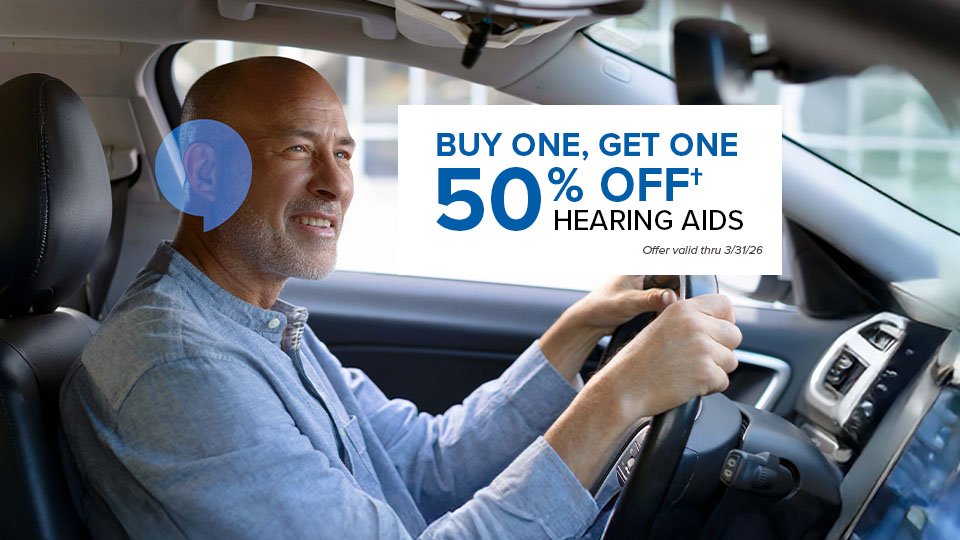 BUY ONE, GET ONE 50% OFF† HEARING AIDS - Offer valid thru 3/31/26. -- Man smiling and driving a car