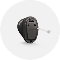Oticon Own ITC in-the-canal hearing aid with sleek black design and pull cord.