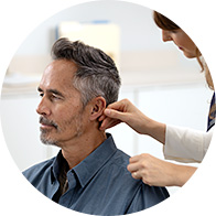 Person being fitted with hearing aid