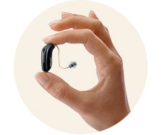 hand holding the Oticon Jet PX hearing aid