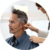 Person being fitted with hearing aid