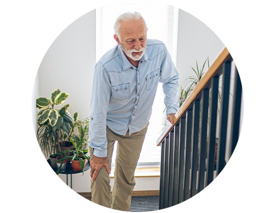 Man about to fall on a flight of stairs