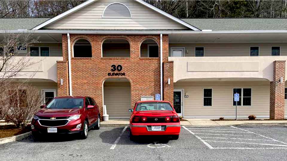 HearingLife clinic in Lexington, VA with parking spaces and accessible entrance.