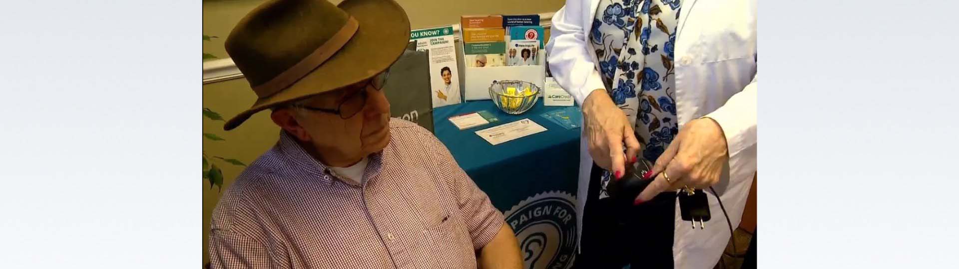Isaac Allison receives free hearing aids provided by The Campaign for Better Hearing.