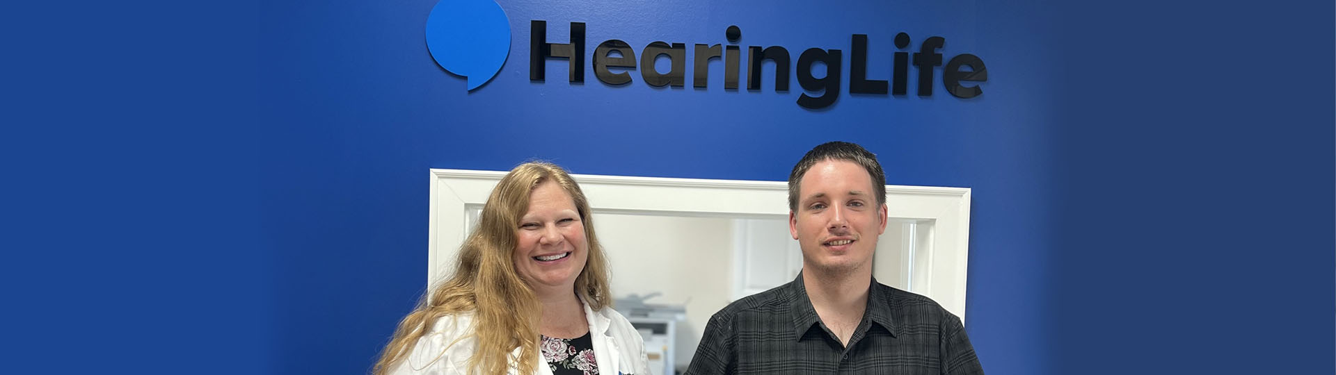Tim Kerr with a team member at the HearingLife clinic in Morehead City, North Carolina