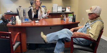 Jerry receiving free hearing aids during a consultation through The Campaign for Better Hearing