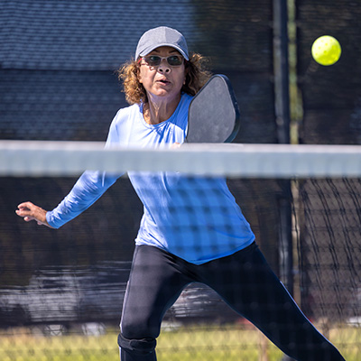 Woman playing Pickleball