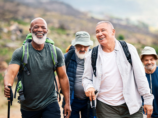 Friends hiking and wearing hearing aids