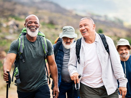 Friends hiking and wearing hearing aids