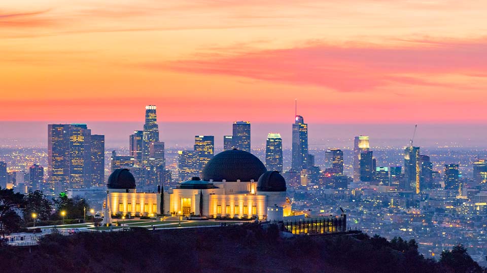 los angeles skyline and griffith observatory at dusk