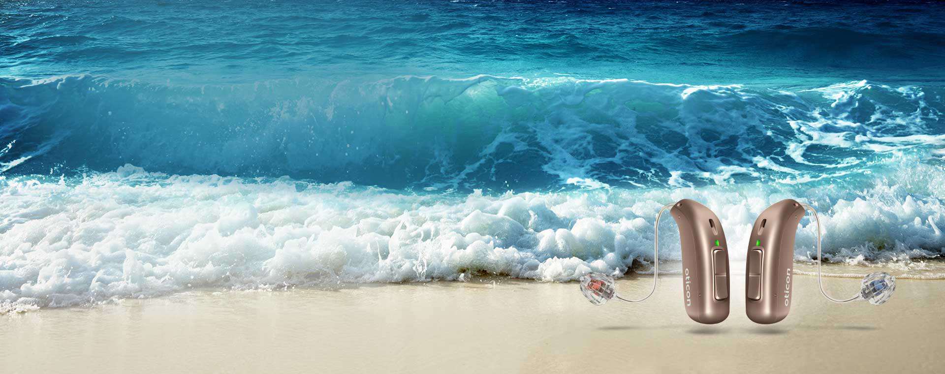 Hearing aids with ocean in the background