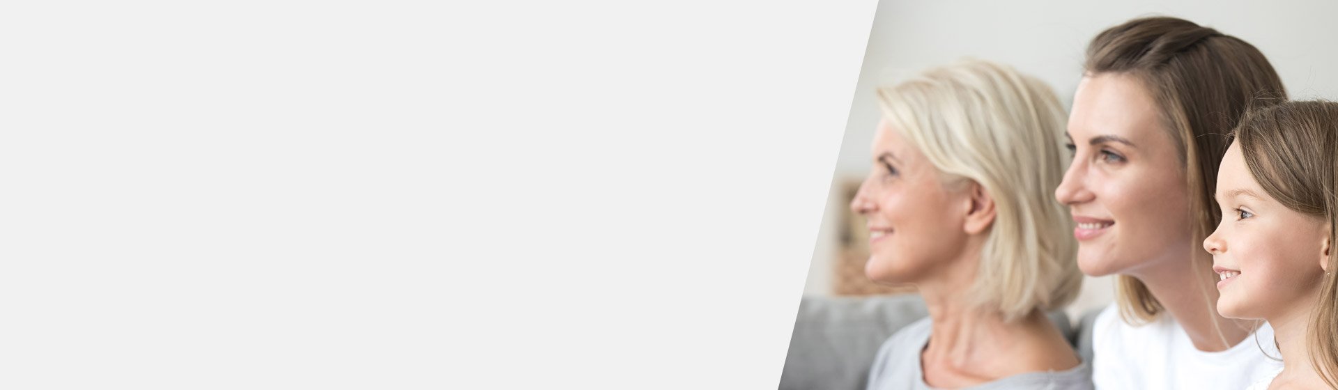 Three generations of women sitting together, highlighting age-related hearing loss in older adults