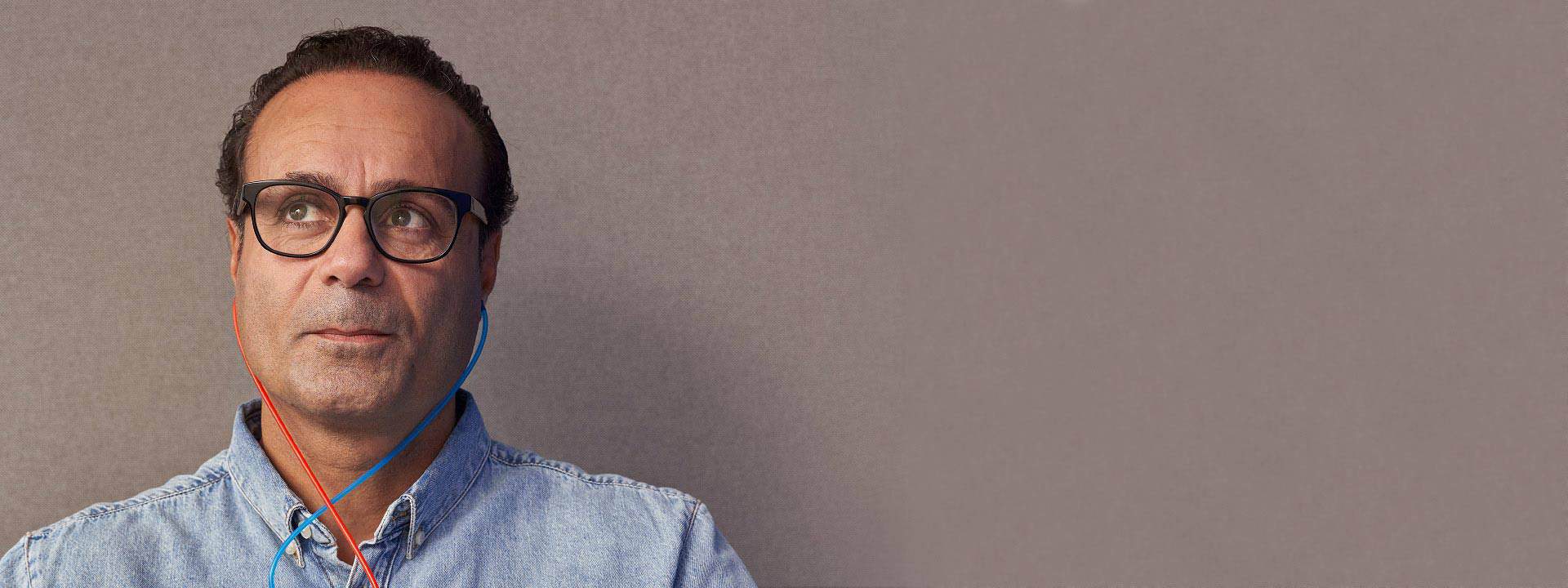 Man wearing headphones during a hearing assessment.