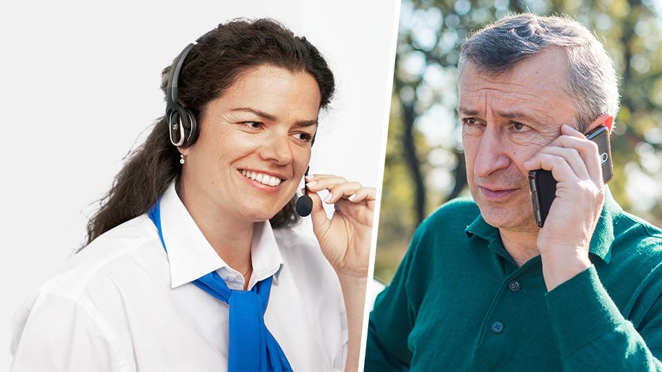 Audiologist wearing a headset discussing hearing loss severity with a man over the phone.