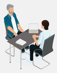 Man and audiologist discussing hearing care options at a desk.